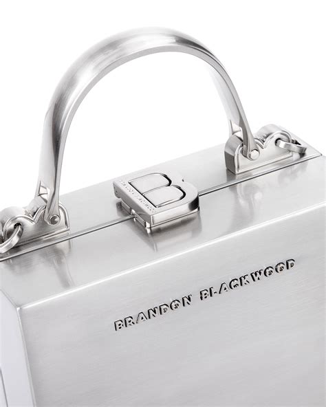 brandon blackwood trunk purse.